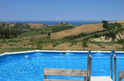 Cologna Spiaggia Villa | Appartement dans une maison de vacances avec climatisation, WIFI, bain à remous, piscine, TV, patio