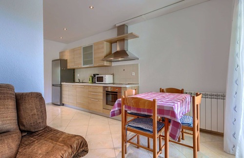 Cancini Appartement | Agréable appartement pour 4 personnes avec climatisation, WIFI, TV, terrasse et parking