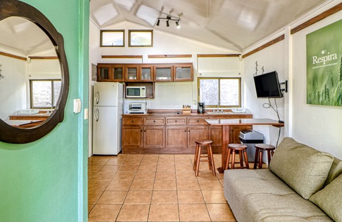 Santa Eulalia Maison | Belle cabine au rez-de-chaussée, avec piscine partagée, entourée de jardins à Atenas