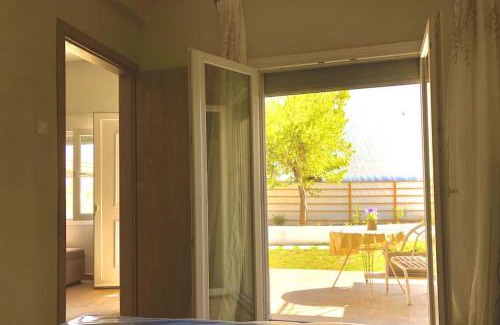 Ano Lechonia Appartement | Lovely House by the Sea with Garden and BBQ (A)