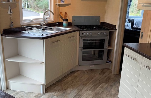 Watchet Maison | Lovely peaceful caravan site set in wooded grounds-private access to the beach