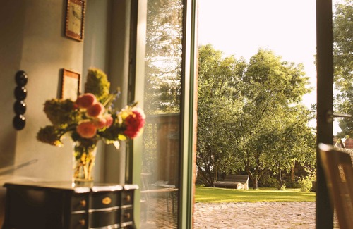 Klosterdorf Maison | Lovingly restored fieldstone barn with fireplace and woodchip heating.