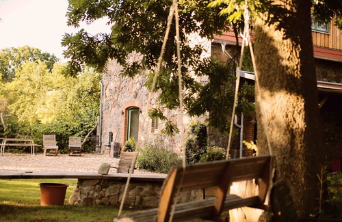 Klosterdorf Maison | Lovingly restored fieldstone barn with fireplace and woodchip heating.