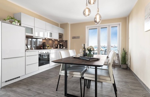 Olpenitz Appartement | Low-barrier Baltic Sea vacation apartment "Zweite Heimat" with water view and sauna