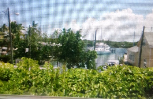 Man O War Cay Cottage | Chalet loyaliste, plafond cathédrale, génératrice, A. C., voiturette de golf gratuite pour votre usage