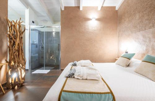 Gonnesa Lit Et Petit-Déjeuner | LUVIA ROOMS SPA