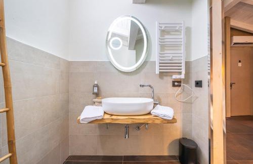 Gonnesa Lit Et Petit-Déjeuner | LUVIA ROOMS SPA