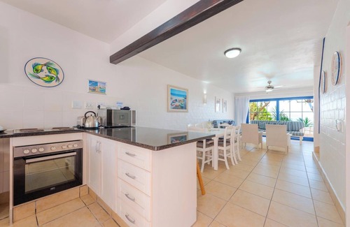 Mykonos Appartement | Luxe Beachside Retreat | Patio | Resort Perks