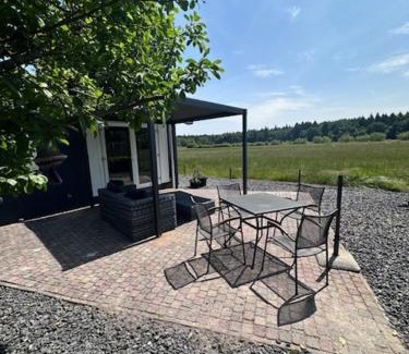 Papenvoort Chalet De Ski | Luxe chalet met uniek vrij uitzicht op rustig park in Papenvoort DRENTHE