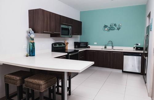 Barrio Santa Lucia Copropriété | Condo luxueux, 10min à pied de la plage / ville, piscine et commodités incroyables!
