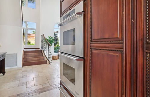 Tropic Isle Maison | Luxurious Delray Beach Waterfront Pool Home w/ outdoor kitchen & hot tub!