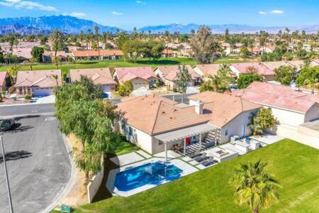 Indio Maison | Luxurious Getaway Near Coachella Stagecoach Pool Putting Green Parking Firepit Sleeps 11