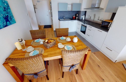 Pelzerhaken Appartement | Luxurious new-build vacation apartment for 2-4 guests with direct sea view and wallbox