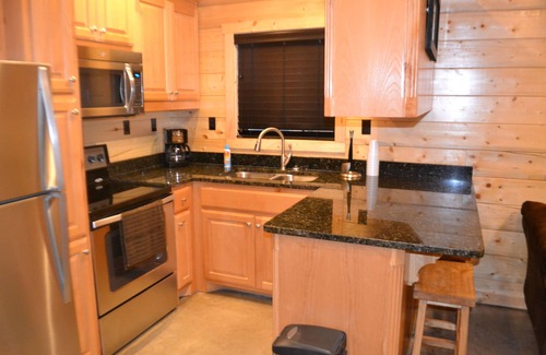 Shreveport Cabine | Luxueux chalet romantique en bois rond au nord de Shreveport