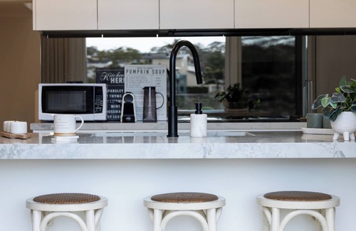 Oatley Maison | Luxurious Waterfront Retreat with Tennis Court