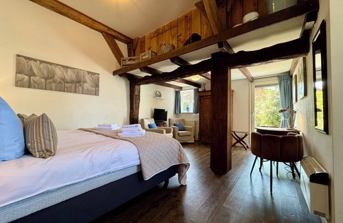 Wilsum Lit Et Petit-Déjeuner | Luxury B&B room at Hofstede de rieke Smit - room 1