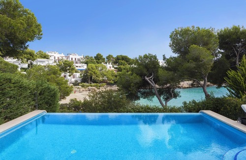 Cala d'Or Maison | Villa de luxe en bord de mer, directement sur la plage, à 20 m de la ville, piscine chauffée (avril-octobre)