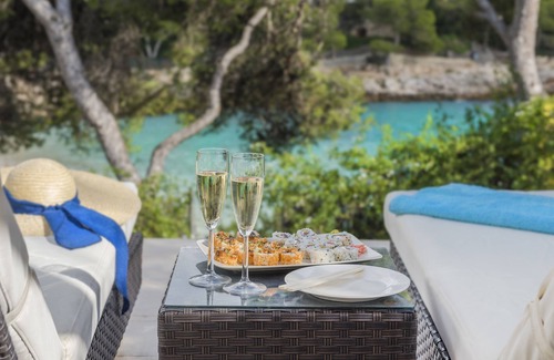 Cala d'Or Maison | Villa de luxe en bord de mer, directement sur la plage, à 20 m de la ville, piscine chauffée (avril-octobre)