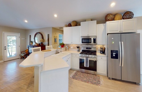 New Smyrna Beach Maison | Luxury Beachside Home w\private heated pool/spa Bikers welcome!