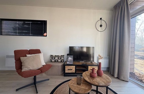 Municipality of Hellendoorn Chalet De Ski | Luxury chalet with hot tub in wooded area of the Sallandse Heuvelrug