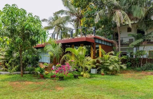 Morjim Maison | Luxury cottages in lush green panoramic windows