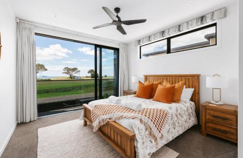 Papamoa Beach Maison | Luxury Escape with ocean views.