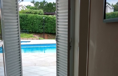 Salto Maison | MAISON DE LUXE DANS CONDO FERMÉ AVEC PISCINE ET COUR DE TENNIS PRIVÉE
