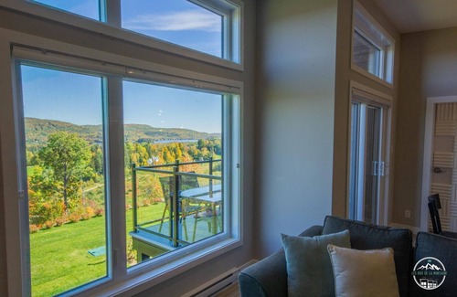 Saint-Jean-de-Matha Copropriété | Condo luxueux en montagne avec vue sur golf et glissades