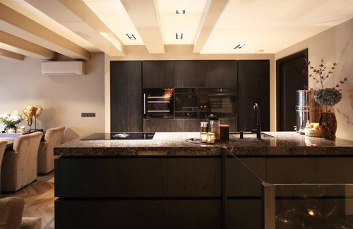 Nieuwmarkt en Lastage Appartement | Luxury, Newly Remodeled Apartment in 16th Century Warehouse, with Boat