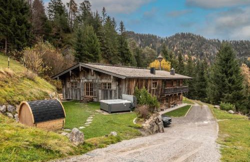 Scheffau am Wilden Kaiser Villa | Luxury old wood mountain chalet in a sunny secluded location with gym, sauna & whirlpool