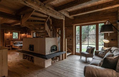 Scheffau am Wilden Kaiser Villa | Luxury old wood mountain chalet in a sunny secluded location with gym, sauna & whirlpool