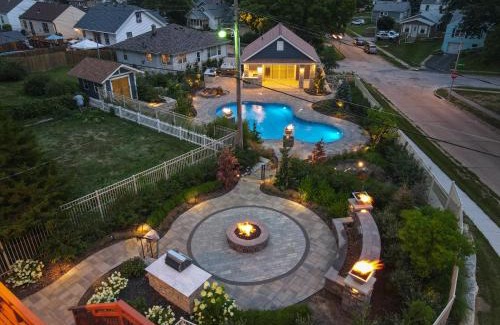 Southeast Omaha Maison | Luxury Oasis Heated Pool, Hot Tub, BBQ