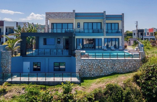 Epworth Villa | Luxury Oceanfront Villa~ Fully Staffed~Pool~Jacuzzi~Movie Theatre
