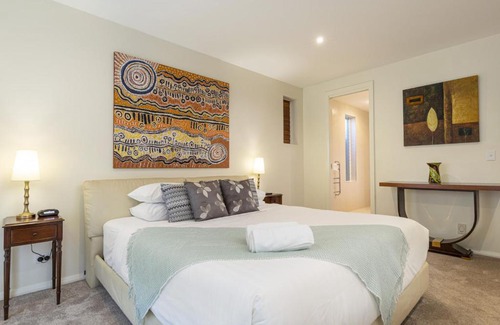 Pelican Waters Maison | Luxury resort style villa pool by Custom Bnb Hosting