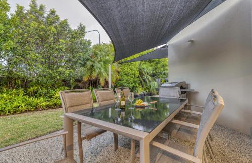 Pelican Waters Maison | Luxury resort style villa pool by Custom Bnb Hosting