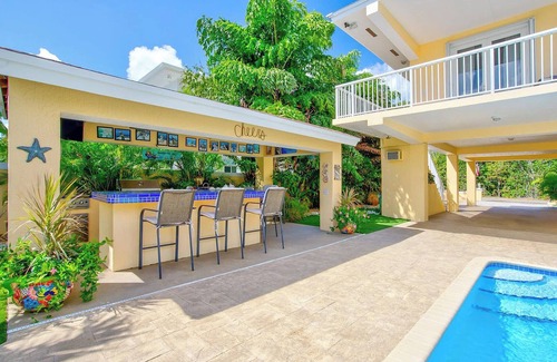 Twin Lakes Maison | Luxury Water Front Home, Private Pool, Spa, Tiki Bar, 36' Foot Dock with Kayaks