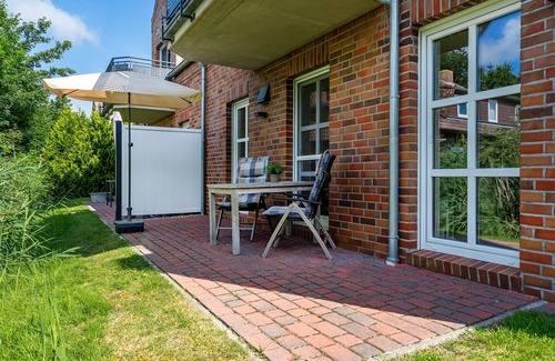 Greetsiel Appartement | Mühlenblick 02 - Moderne Ferienwohnung mit Blick auf die Zwillngsmühlen
