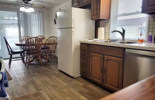 Fair Haven Maison | Macs Lake Escape, 2 waterfront homes with 2 boat wells. Lakefront relaxation!