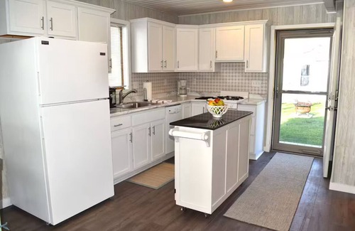 Fair Haven Maison | Macs Lake Escape, 2 waterfront homes with 2 boat wells. Lakefront relaxation!