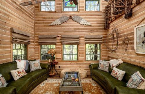 Dennis Maison | Magical Treehouse with Slide by Brazos River for Family Glamping Adventures in Texas