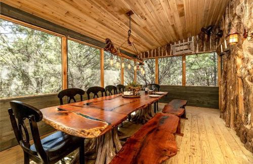 Dennis Maison | Magical Treehouse with Slide by Brazos River for Family Glamping Adventures in Texas