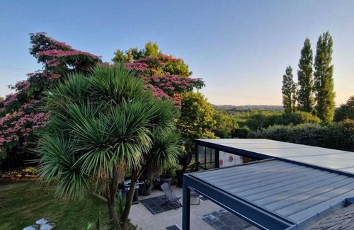 Locmaria-Grand-Champ Maison | maison avec piscine couverte et chauffée et pergola bioclimatique de 30m²