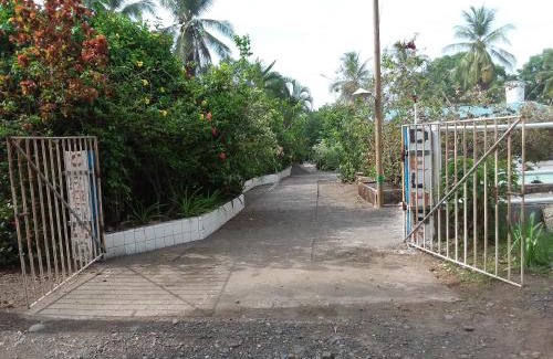Parrita Maison | Maison du Bonheur costaricienne sur la plage avec bassin de rafraichissement