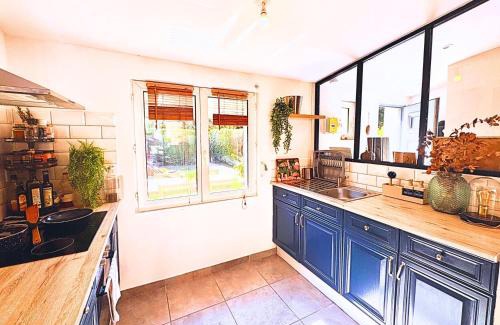 Fives Maison | Maison Langevin 2-Bedroom House with Cozy Garden & Patio