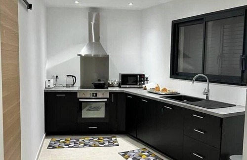 Folelli Appartement | Maison situé en plein centre ville de folelli.