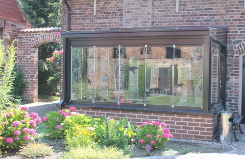 Bad Saarow Appartement | Maisonnette avec jardin d'hiver et vue sur le lac et la cour - Ferienhof Löschebrand
