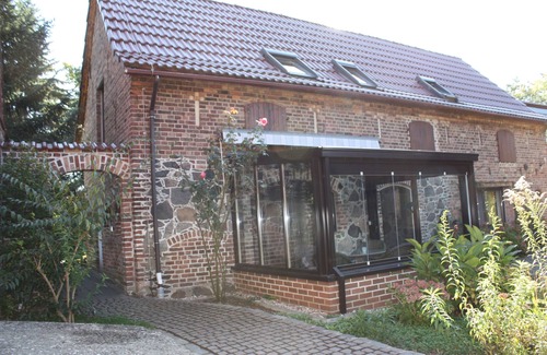 Bad Saarow Appartement | Maisonnette avec jardin d'hiver et vue sur le lac et la cour - Ferienhof Löschebrand