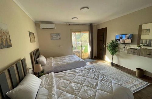 Al-'Umraniyah Lit Et Petit-Déjeuner | Malek Pyramids Guest House Apartment 4