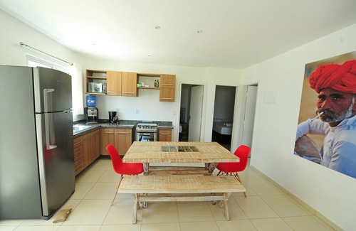 Pilar Appartement | Manga Verde Beach 01: Vue sur le jardin et la plage H
