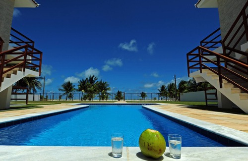 Pilar Appartement | Manga Verde Beach 01: Vue sur le jardin et la plage H